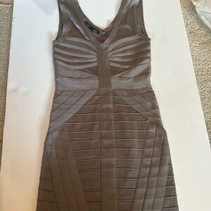 Stone Bandage BeBe Mini Dress. Super cute! Shapes the body well. M